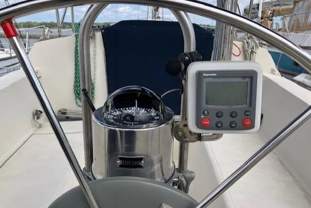 Slide: The Image of Steering wheel and navigation instruments on a 1981 S2 11.0A sailboat. - 14