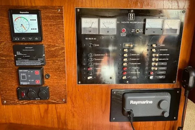 Slide: The Image of Electrical control panel on a 1981 S2 11.0A yacht with Raymarine equipment. - 26