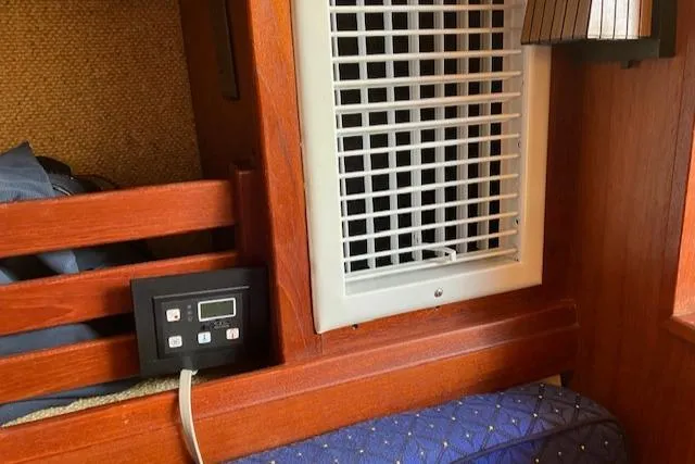 Slide: The Image of Wooden interior of 1981 S2 11.0A boat with vent and control panel. - 33