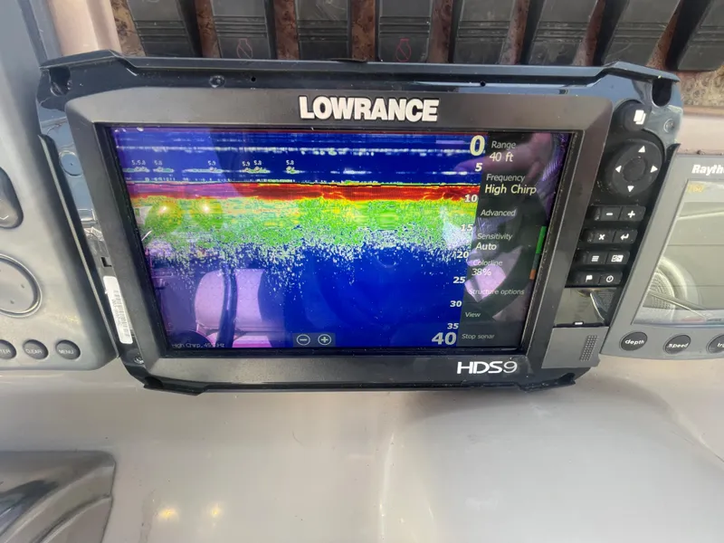 Slide: The Image of Lowrance HDS9 fishfinder on 2001 Sea Ray 290 Amberjack displaying sonar data. - 28