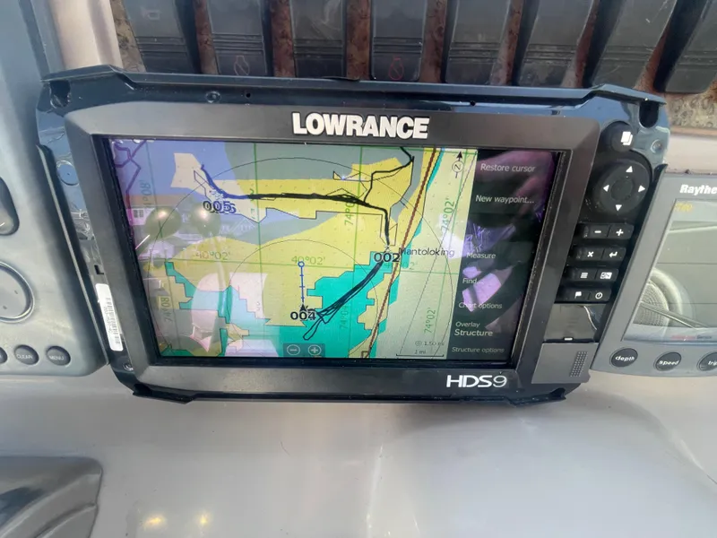 Slide: The Image of Lowrance HDS9 marine GPS on 2001 Sea Ray 290 Amberjack dashboard. - 29