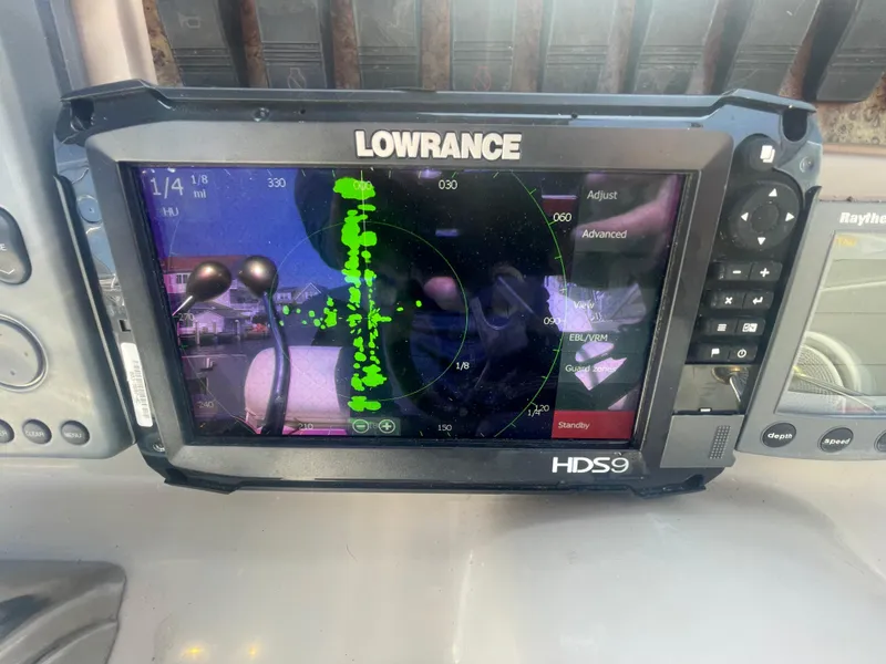 Slide: The Image of Lowrance HDS9 marine GPS system on 2001 Sea Ray 290 Amberjack boat dashboard. - 30