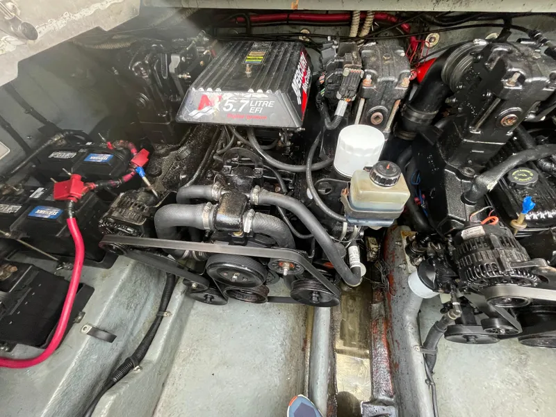 Slide: The Image of Engine compartment of a 2001 Sea Ray 290 Amberjack with 5.7L EFI engine. - 46