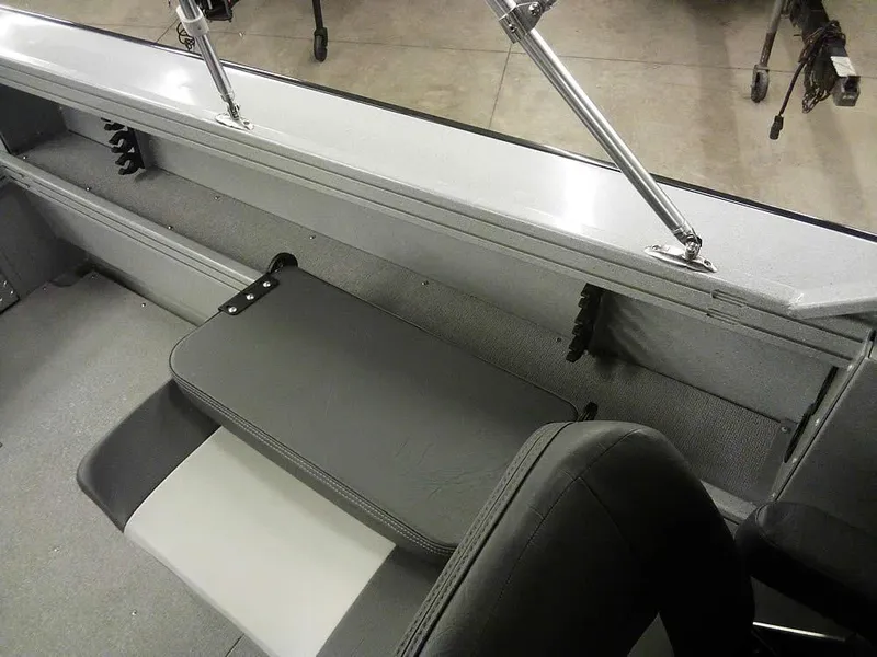 Slide: The Image of 2024 Smoker Craft Phantom 18 X2 interior seating and storage area. - 17