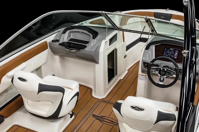 Slide: The Image of Interior of 2025 Chaparral 21 SSi I/O boat with modern seating and dashboard. - 16