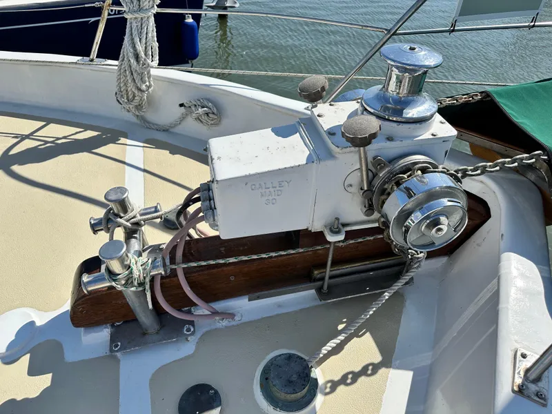 Slide: The Image of Anchor windlass on 1981 Island Trader 46 sailboat deck. - 36