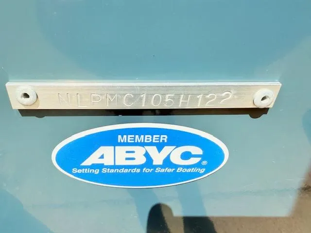 Slide: The Image of 2022 Tidewater 256 CC Adventure boat with ABYC member plaque and serial number. - 19