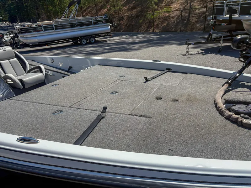 Slide: The Image of 2023 Phoenix 721 ProXP boat deck with seating and storage compartments. - 4