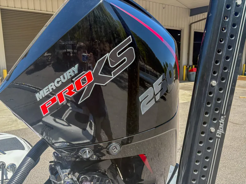 Slide: The Image of 2023 Phoenix 721 ProXP with Mercury ProXS 250 engine, close-up view. - 9