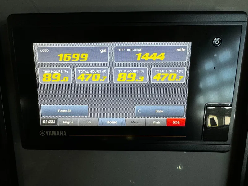 Slide: The Image of Yamaha display showing fuel usage and trip data on 2018 Pursuit OS 355 Offshore. - 20