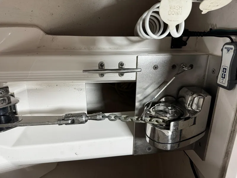 Slide: The Image of 2018 Pursuit OS 355 Offshore boat anchor system with chain and winch. - 46