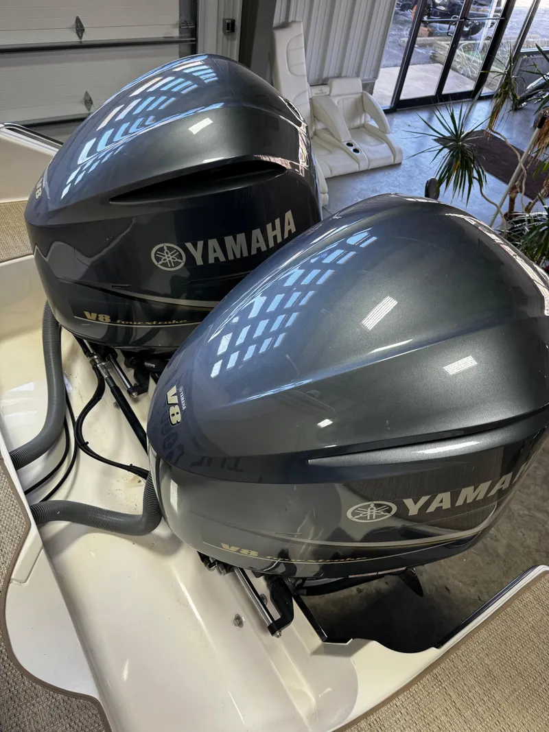 Slide: The Image of Twin Yamaha outboard engines on a 2018 Pursuit OS 355 Offshore boat. - 9