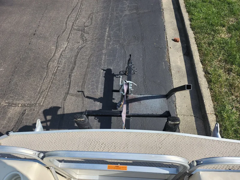 Slide: The Image of 2007 Odyssey Pontoons 222C trailer parked on asphalt road near grass. - 21