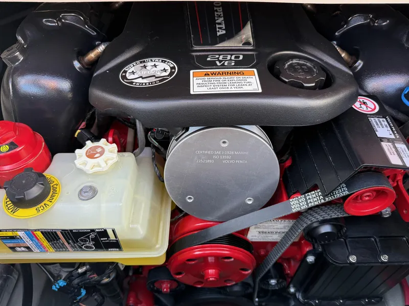 Slide: The Image of Engine of 2025 Crownline Eclipse E235 boat, featuring a 280 V8 motor. - 8