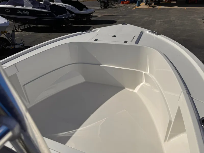 Slide: The Image of 2025 Parker 18SE Center Console boat interior, showcasing spacious seating and sleek design. - 11