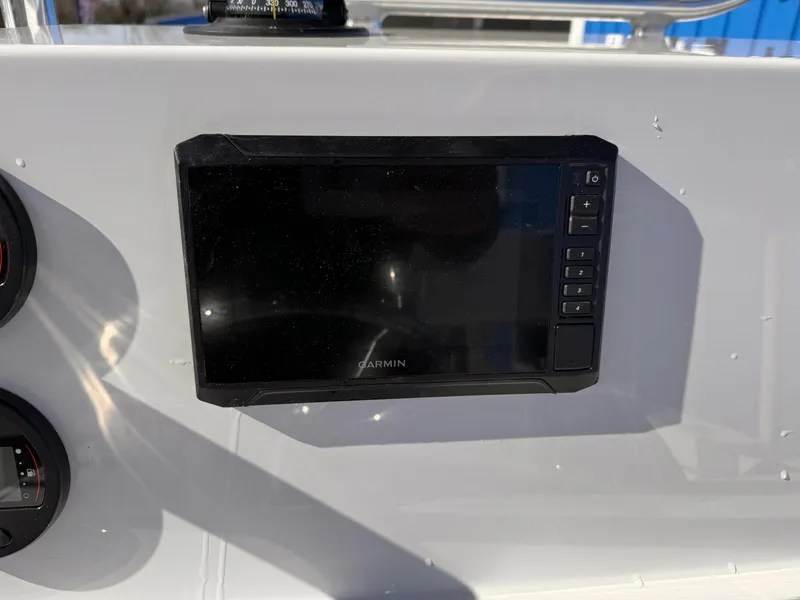 Slide: The Image of Console of 2025 Parker 18SE Center Console boat with Garmin display. - 20