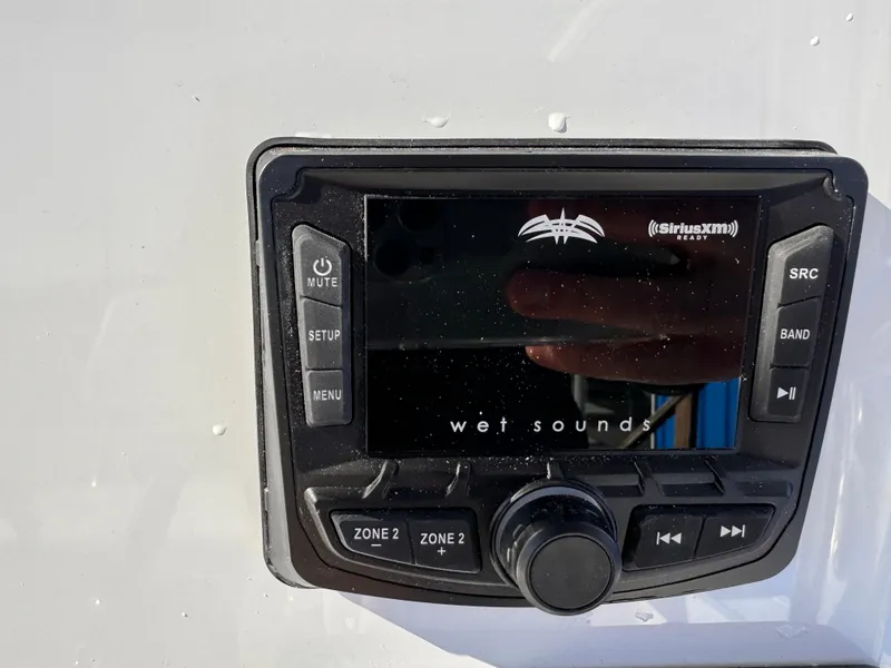 Slide: The Image of Control panel of a 2025 Parker 18SE Center Console boat with Wet Sounds audio system. - 23
