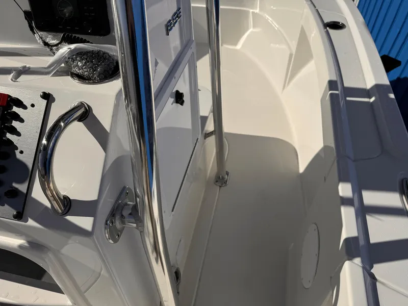 Slide: The Image of 2025 Parker 18SE Center Console boat interior with stainless steel railings and control panel. - 26