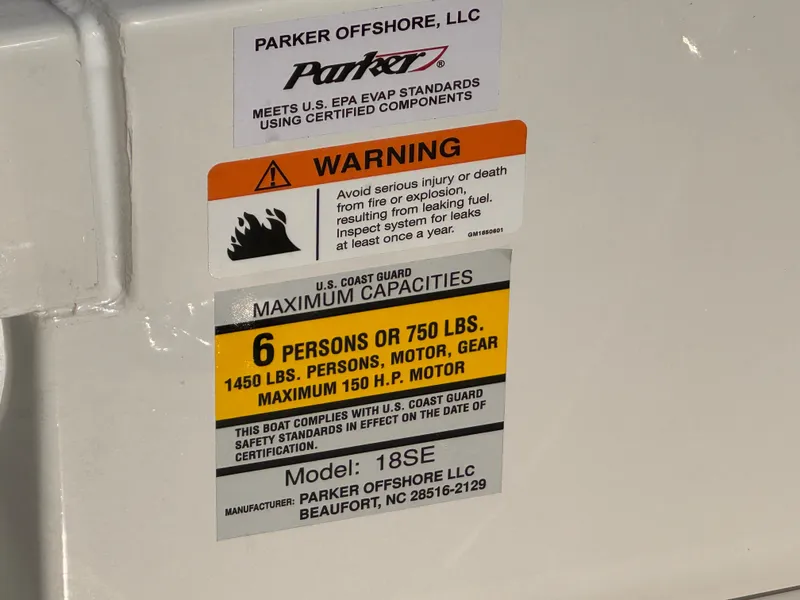Slide: The Image of 2025 Parker 18SE Center Console boat capacity warning label, maximum 6 persons or 750 lbs. - 33