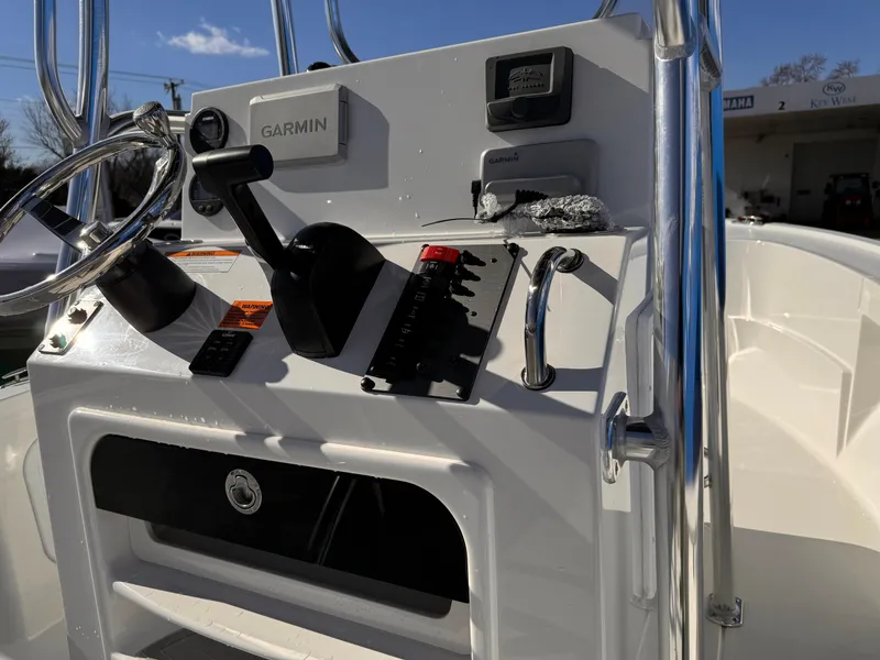 Slide: The Image of 2025 Parker 18SE Center Console boat dashboard with Garmin navigation system. - 37