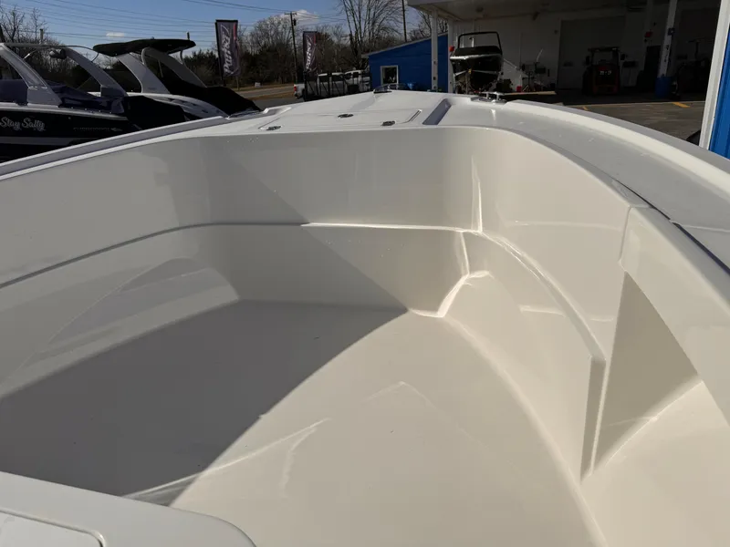 Slide: The Image of 2025 Parker 18SE Center Console boat interior, showcasing sleek design and spacious seating area. - 38