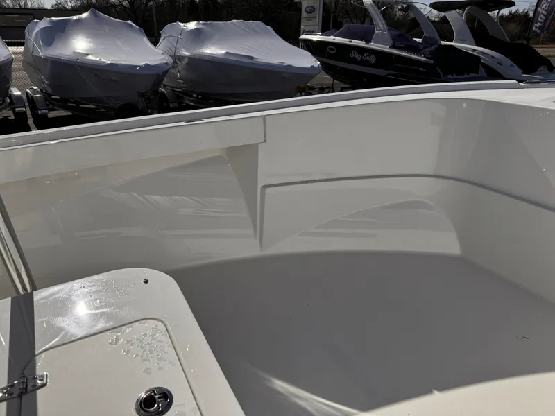 Slide: The Image of 2025 Parker 18SE Center Console boat interior with sleek white finish. - 40