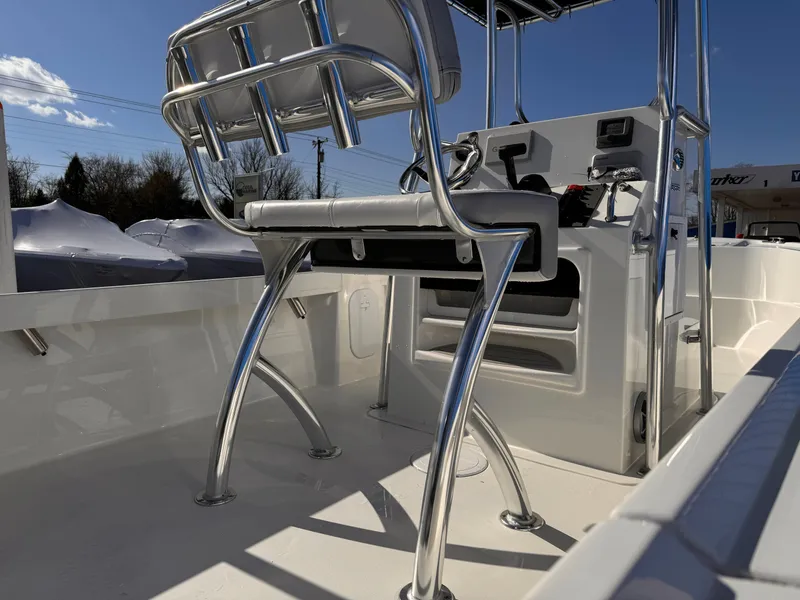 Slide: The Image of 2025 Parker 18SE Center Console boat interior with sleek seating and control panel. - 45