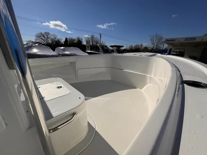 Slide: The Image of 2025 Parker 18SE Center Console boat interior under clear blue sky. - 47