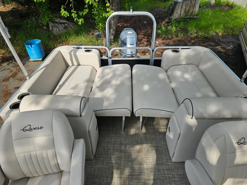 Slide: The Image of 2018 Apex Marine Qwest LS 820 RLS pontoon boat with beige seating and Yamaha outboard motor. - 13