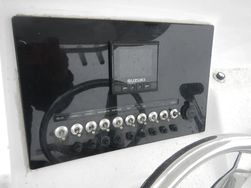Slide: The Image of Control panel of 2018 Sea Pro 219 Center Console boat with Suzuki display. - 8