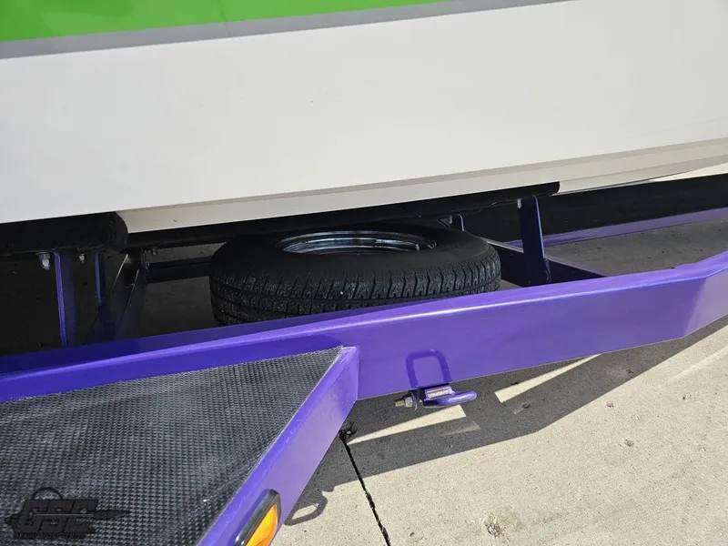 Slide: The Image of Purple trailer with spare tire, Nordic 28 Heat MCOB, 2007 model. - 16