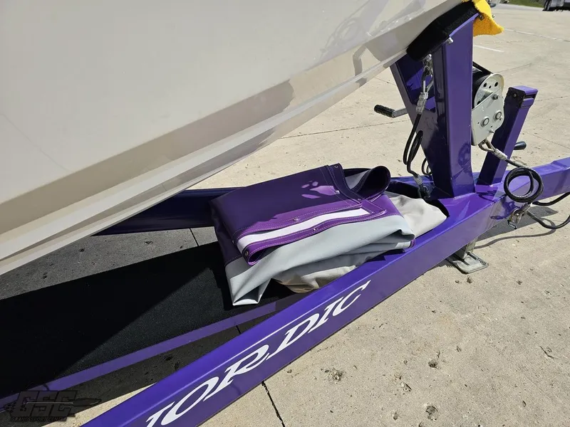 Slide: The Image of Purple trailer for 2007 Nordic 28 Heat MCOB boat with cover. - 17