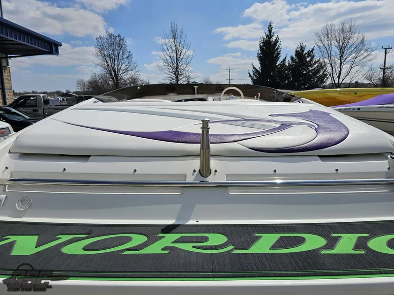 Slide: The Image of Nordic 28 Heat MCOB boat, 2007 model, with sleek design and vibrant graphics. - 38