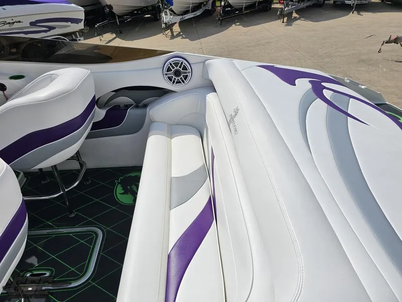 Slide: The Image of Luxury Nordic 28 Heat MCOB boat interior with white and purple seating, 2007 model. - 45