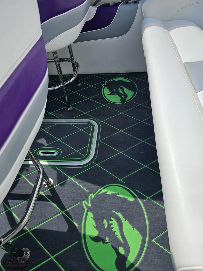 Slide: The Image of Interior of a 2007 Nordic 28 Heat MCOB boat with custom green dragon floor design. - 46