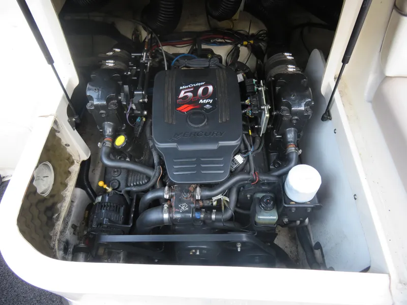 Slide: The Image of 2004 Sea Ray 220 Sundeck engine compartment with MerCruiser 5.0 MPI engine. - 6