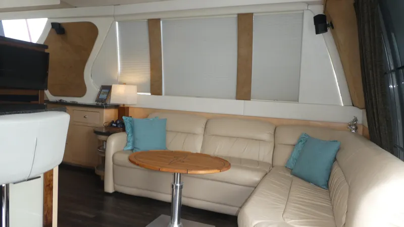 Slide: The Image of Luxurious interior of 1998 Carver 530 Voyager Pilothouse with leather seating and modern decor. - 13