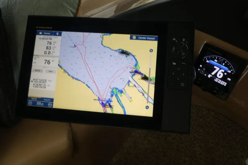 Slide: The Image of Navigation system on 1998 Carver 530 Voyager Pilothouse displaying nautical chart and speedometer. - 20