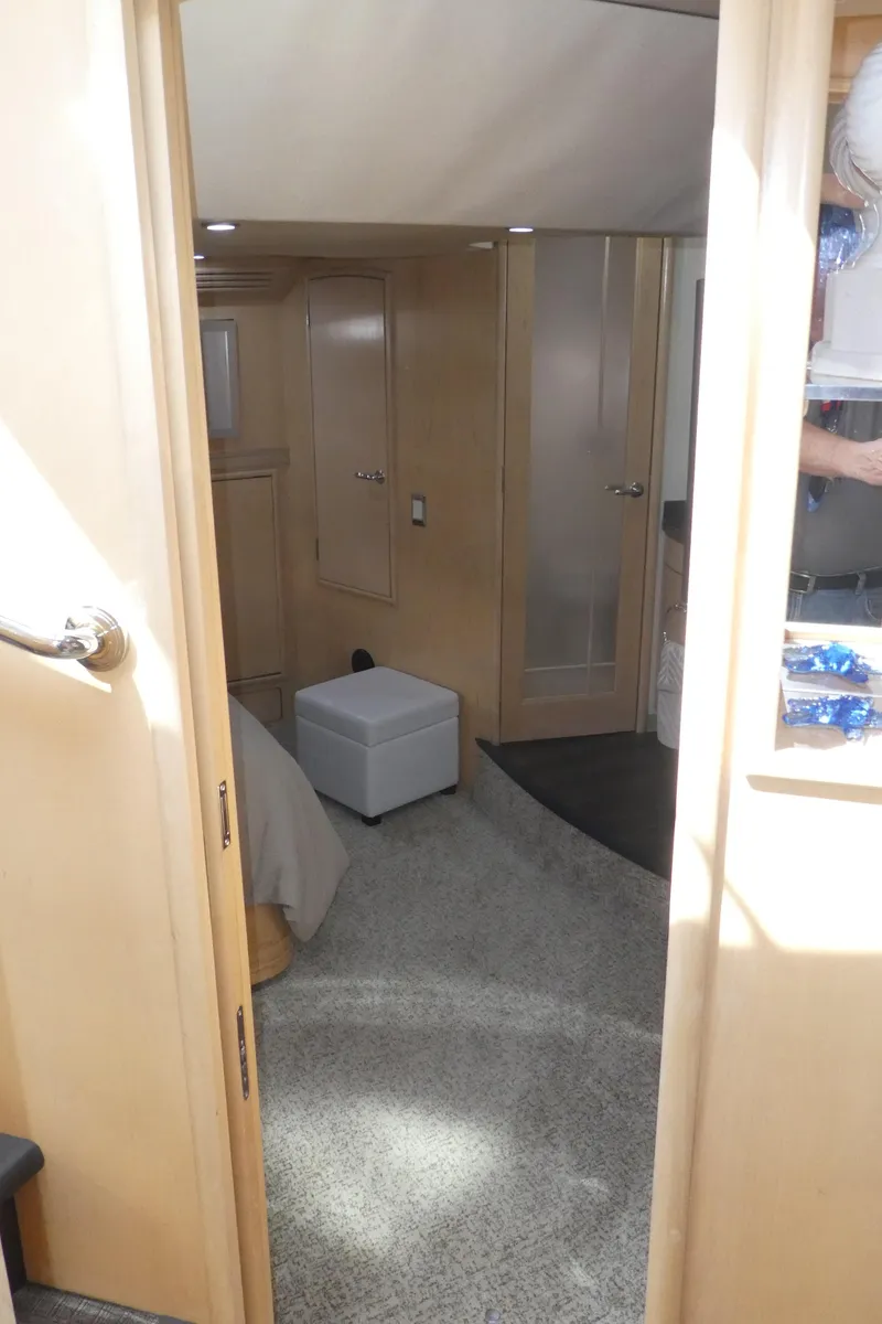Slide: The Image of Interior of 1998 Carver 530 Voyager Pilothouse with modern furnishings and carpeted flooring. - 33
