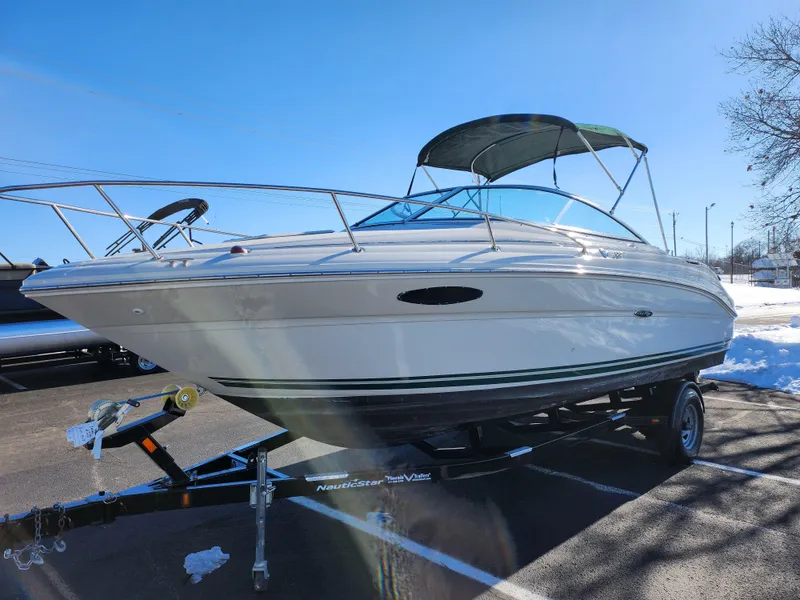Slide: The Image of 2004 Sea Ray 225 Weekender boat on trailer, sunny day, blue sky background. - 5