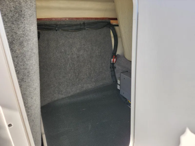 Slide: The Image of Interior storage compartment of 2016 Chaparral Vortex 203 VRX boat. - 15