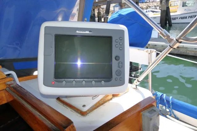 Slide: The Image of Marine navigation system on 1978 Brewer 45 Ketch sailboat, docked at marina. - 25