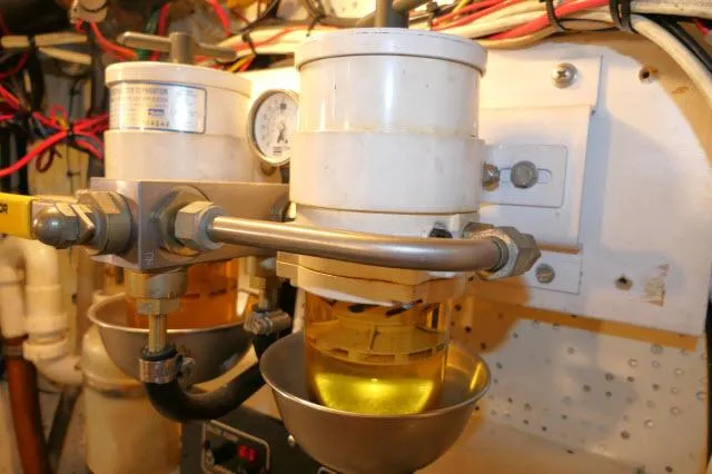 Slide: The Image of Fuel filtration system in a 1978 Brewer 45 Ketch engine room. - 47