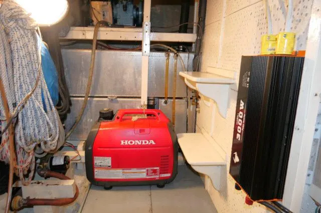 Slide: The Image of Engine room of 1978 Brewer 45 Ketch with Honda generator and inverter. - 49