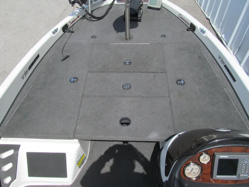 Slide: The Image of 2005 Ranger 185 VX boat deck with control panel and storage compartments. - 10