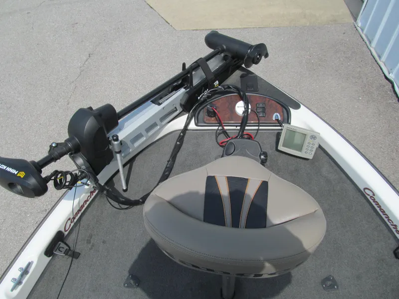 Slide: The Image of 2005 Ranger 185 VX boat cockpit with seat, trolling motor, and fish finder. - 7