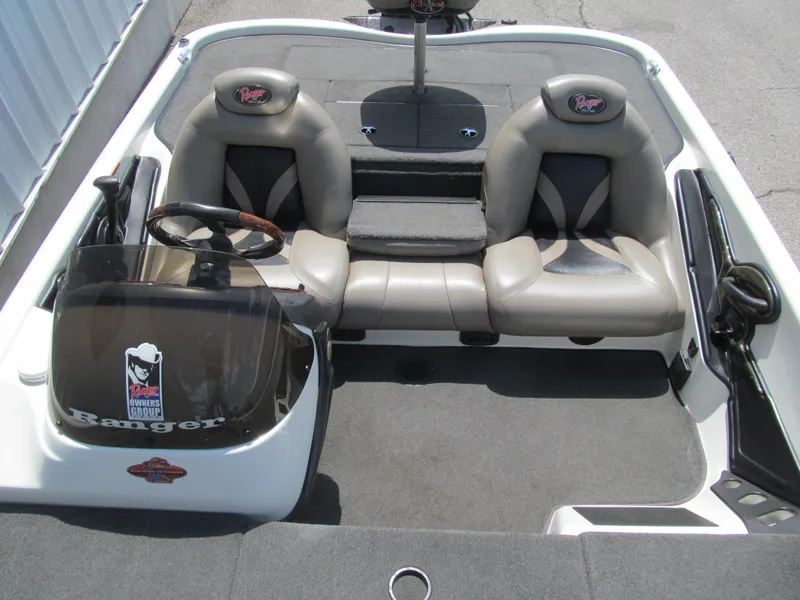 Slide: The Image of 2005 Ranger 185 VX boat interior with dual seats and steering wheel. - 9