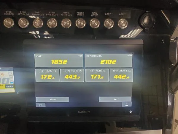 Slide: The Image of Garmin display on 2023 World Cat 260 CC-X showing trip data and engine hours. - 11
