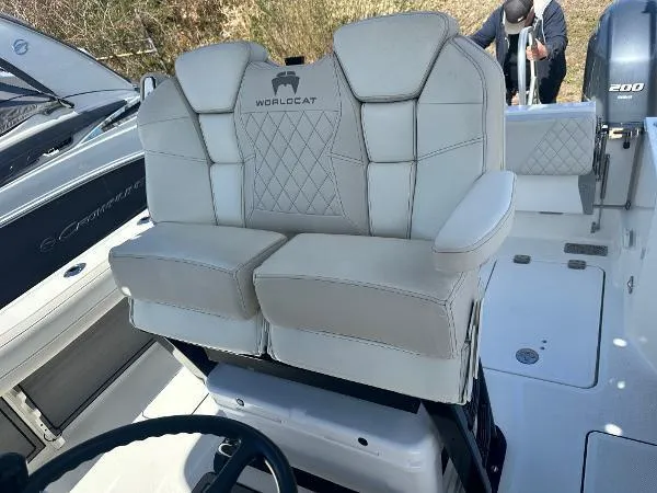 Slide: The Image of 2023 World Cat 260 CC-X boat with luxurious seating and modern design. - 8