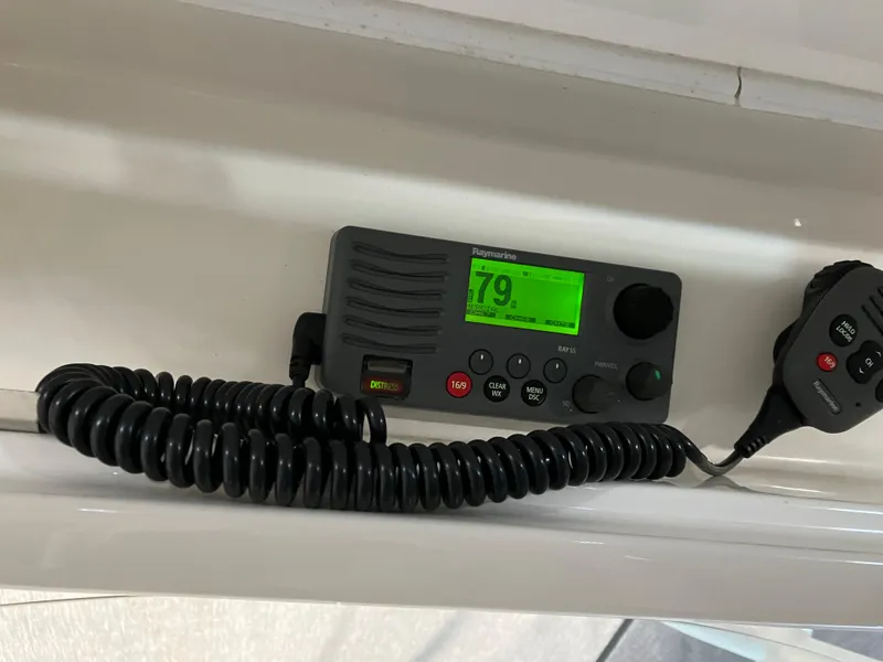 Slide: The Image of VHF marine radio on a 2013 Regulator 28 boat, displaying channel 79. - 15
